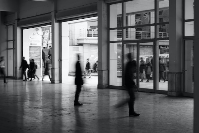 Black and white daytime view of the entrance to the foyer of a busy hot desking and virtual office in London image at LondonOfficeSpace.com.