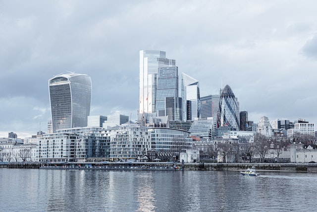 Daytime view across the River Thames at London City skyline with all its innumerable hot desking and virtual office in London options image at LondonOfficeSpace.com.