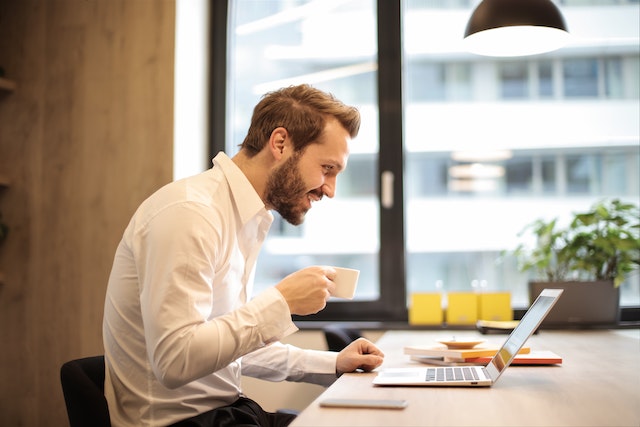 man working in well lit office