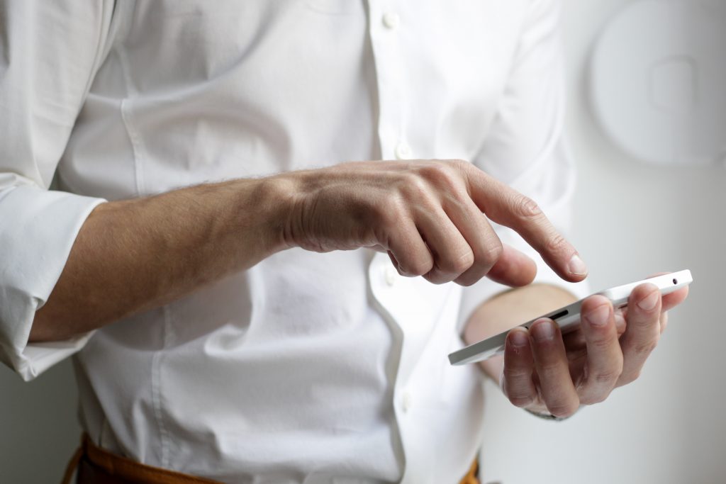 man on phone negotiating office lease